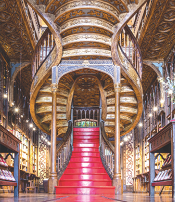 image of a the grand library steps of the Livraria Lello in Porto, Portugal.